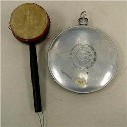 Musical drum instrument and an aluminum canteen (46)