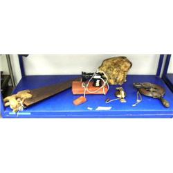 Shelf of measuring device, child's sewing machine, wood and 2 antique hand saws (46)