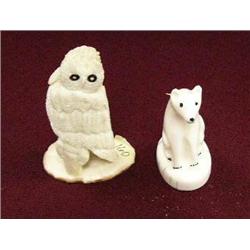 Lot of 2 ivory carvings- 1 is dog and other is an owl: dog is signed, owl is signed Shyravl H (100)