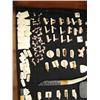Image 2 : Lot of: Alaskan Scrimshaw Kits, key chains, abalones necklaces strung with thin leather, 25 miniatur