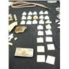 Image 3 : Lot of: Alaskan Scrimshaw Kits, key chains, abalones necklaces strung with thin leather, 25 miniatur