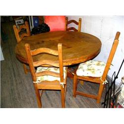 55" diameter round solid pine table with set of 4 chairs  (42)