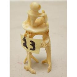 3-1/2" toopolook carved from a whale's tooth (37)