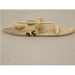 5-1/2" fossilized ivory kayaker made by J. Koyuk (37)
