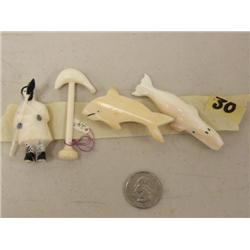 4 ivory carvings: man and 3 whales (37)