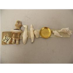 Lot of 6 ivory carvings and small gold pan (37)
