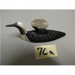 CHOICE on four 3" long ivory loons by Charlie Kokuluk: red throated loon with babies on back, stock 