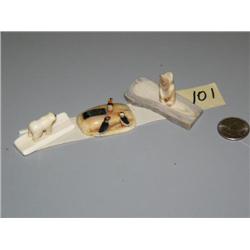 1" tall carvings of bear, 3 puffins, and a man (2)