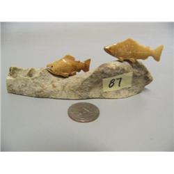 2 carved bone salmon 2" long mounted on walrus jawbone (2)