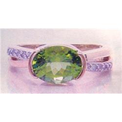 Peridot and Diamond Lady's Ring 14 K yellow gold- peridot is oval, faceted approx. 2.00 carats trans