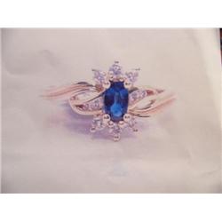 Sapphire and Diamond Lady's Ring 14 K yellow gold- sapphire is oval, faceted approx. 0.40 carats tra