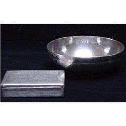 A RECTANGULAR SILVER BOX