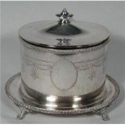 AN OVAL SILVER PLATED ON COPPER TEA CADDY