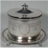 Image 1 : AN OVAL SILVER PLATED ON COPPER TEA CADDY