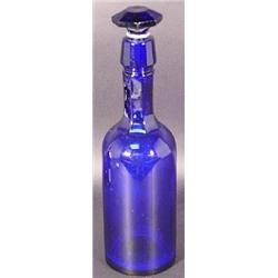 A COBALT BLUE PRESSED GLASS WHISKEY DECANTER