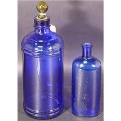 TWO COBALT BLUE GLASS DRUGGIST "BOTTLES"