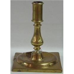 A SPANISH OR DUTCH LATE 17TH C. BRASS CANDLESTICK
