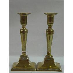 A PAIR OF ENGLISH BRASS PUSH-UP CANDLESTICKS