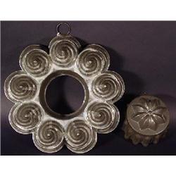 TWO ROUND TIN MOLDS