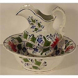 A GAUDY STAFFORDSHIRE PORCELAIN WASH PITCHER AND BASIN