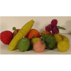 AN ASSORTMENT OF THIRTEEN VARIE-COLOURED "PINNED" FRUIT TABLE ORNAMENTS