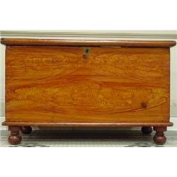 A PENNSYLVANIA DUTCH PAINT GRAINED SMALL SIZE BLANKET STORAGE CHEST