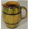 Image 1 : A STONEWARE BARREL SHAPED PITCHER