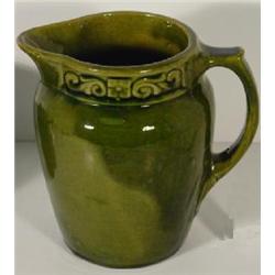GREEN GLAZED STONEWARE PITCHER