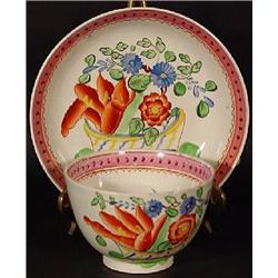 "PEARLWARE" FLORAL ENAMELED HANDLE-LESS TEA CUP AND MATCHING SAUCER