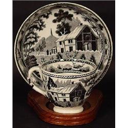 BLACK TRANSFER PORCELAIN TEA CUP AND SAUCER