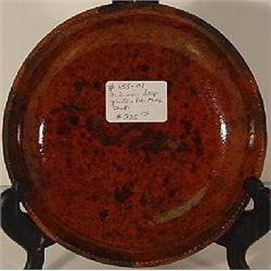 A PENNSYLVANIA REDWARE SHALLOW BOWL / PLATE