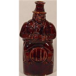 ROCKINGHAM POTTERY FIGURAL BOTTLE