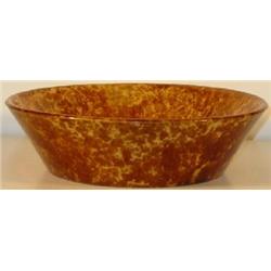 A YELLOW OCHREWARE 10 ¼" ROUND MILK BOWL