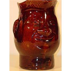 BROWN GLAZED "YELLOW"WARE CHARACTER PITCHER