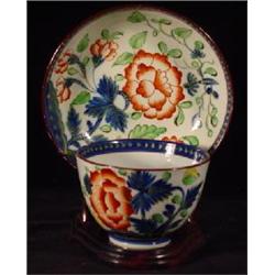 GAUDY DUTCH PORCELAIN HANDLELESS TEA CUP AND SAUCER