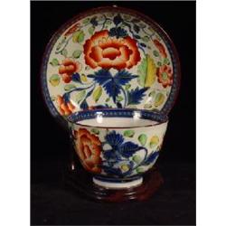 GAUDY DUTCH PORCELAIN HANDLELESS TEA CUP AND SAUCER