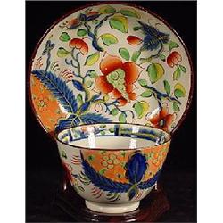 GAUDY DUTCH PORCELAIN HANDLELESS TEA CUP AND SAUCER