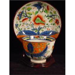 GAUDY DUTCH PORCELAIN HANDLELESS TEA CUP AND SAUCER