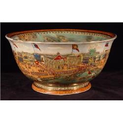AN OVERGLAZED, ENAMELED, FOOTED PORCELAIN BOWL