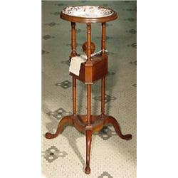 A MAHOGANY QUEEN ANN STYLED MAN'S ROUND SHAVING BASIN STAND