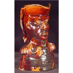 ROCKINGHAM BROWN GLAZED STONEWARE "LORD WELLINGTON JUG