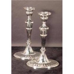 A PAIR OF ENGLISH SHEFFIELD SILVER PLATED CANDLESTICKS