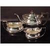 Image 1 : A THREE PIECE ELECTOPLATED NICKEL SILVER TEA SET