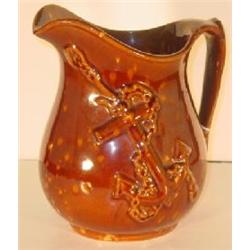 BROWN GLAZED STONEWARE PITCHER