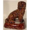 Image 1 : YELLOW OCHREWARE / ROCKINGHAM TORTOISE-SHELL GLAZED, SCULPTED SEATED SPANIEL