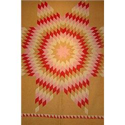 A HAND SEWN PATCHWORK QUILT