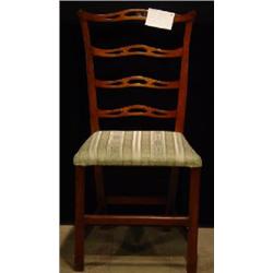 A MAHOGANY PROVINCIAL CHIPPENDALE STYLED LADDER BACK SIDE CHAIR