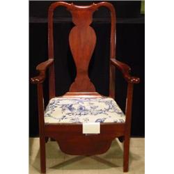 AN AMERICAN CHIPPENDALE MAHOGANY OPEN-ARM CHAMBER CHAIR