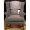 Image 1 : AN UPHOLSTERED WING-BACK ARMCHAIR