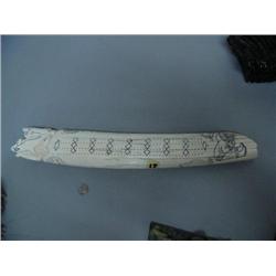 6-pound twenty inch ivory tusk made into cribbage board scrimshawed with eagle, rabbit, man, ram, ca